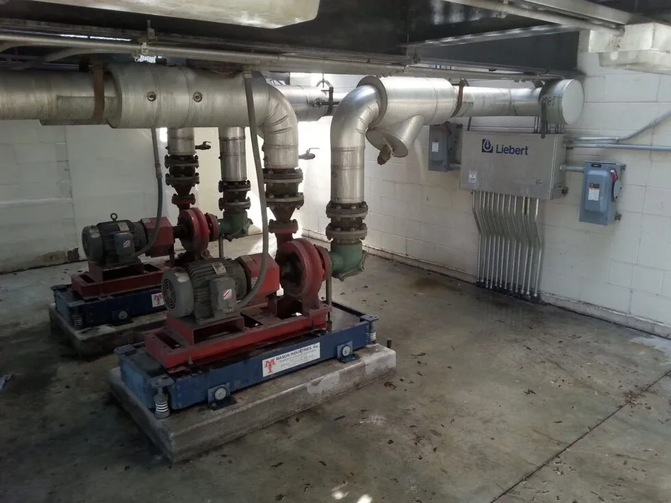 Commercial pumps and piping serviced by Drake