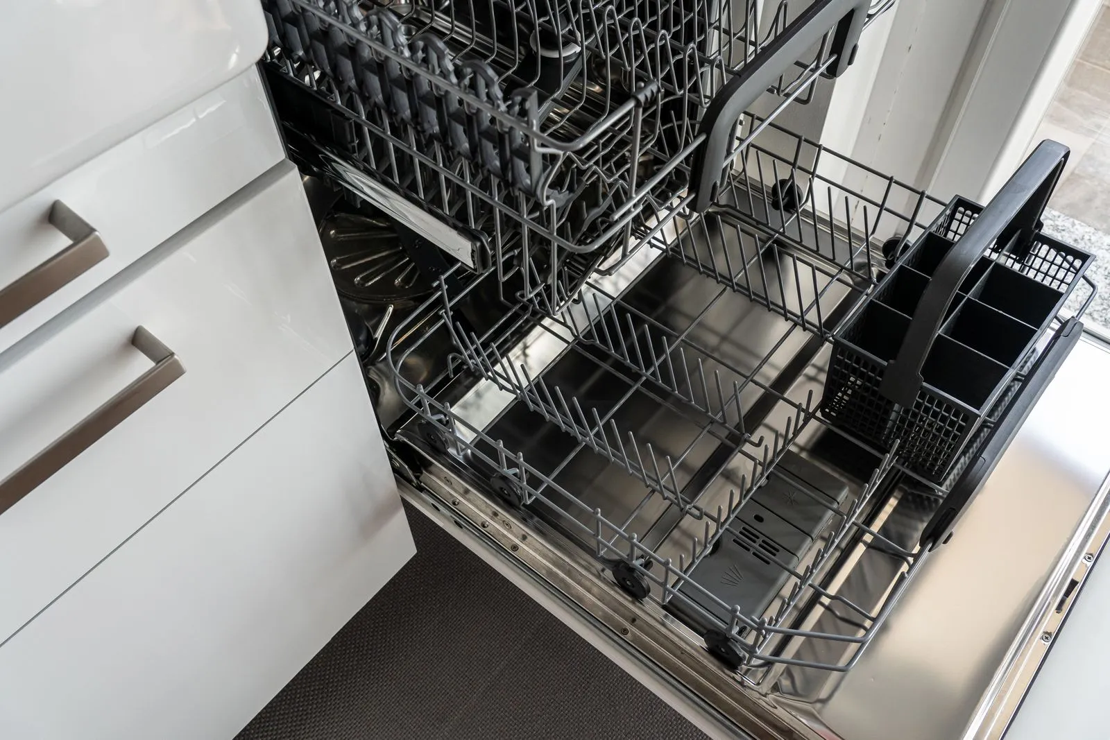 Open dishwasher in a kitchen