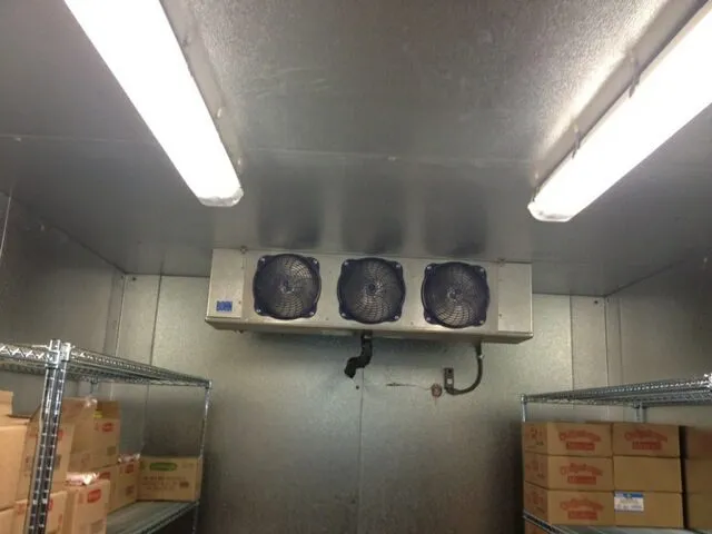 Evaporator fans inside a walk-in cooler